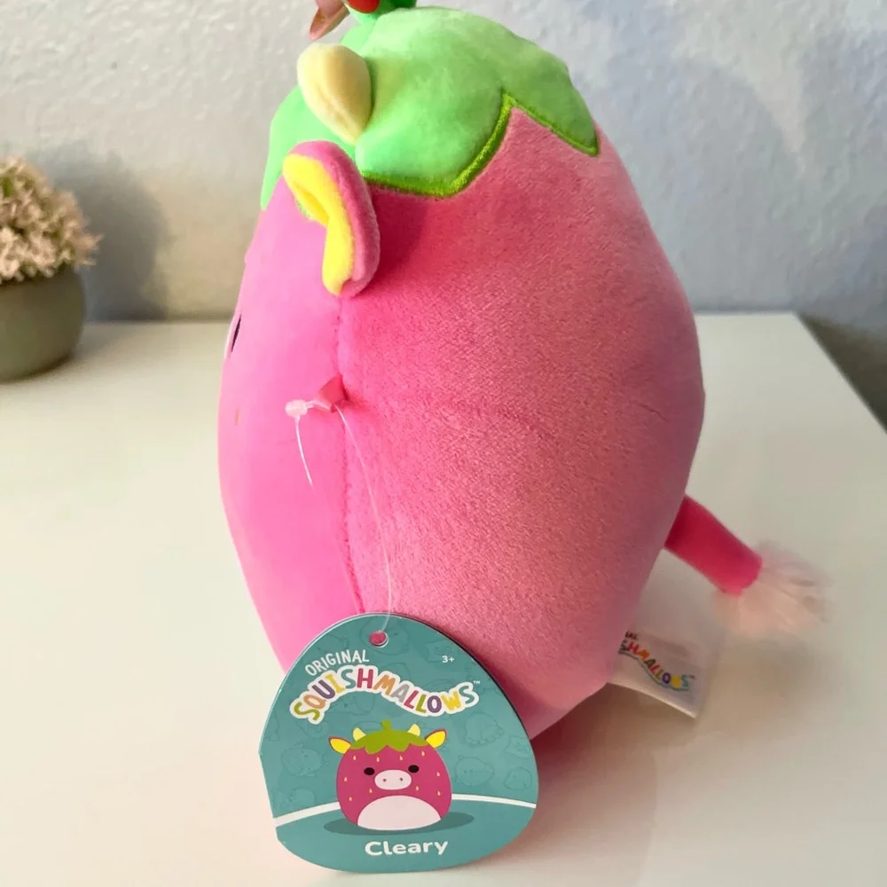Squishmallows Pink Strawberry Cow Plush with Green Leaf Top